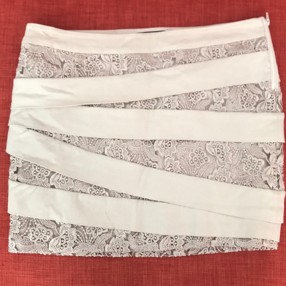BEBE lace fitted mini skirt
